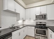 Thumbnail 8 of 38 - Full-Equipped Kitchen with Energy-Efficient Appliances