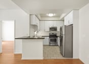 Thumbnail 13 of 38 - Kitchen with Countertop Bar