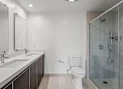 Thumbnail 40 of 71 - Large-Size Bathroom with Walk-In Shower, Double-Sink Vanity, and Cabinet Storage
