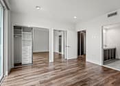 Thumbnail 44 of 71 - Bedroom with Two Closets with Built-In Organizers, Balcony, and Bathroom