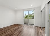 Thumbnail 38 of 71 - Bedroom with Recessed Lighting, Vinyl Flooring, and Two Mirrored Closets