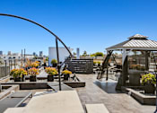 Thumbnail 43 of 49 - Rooftop with Entertainment Area at Gramercy Park by Wiseman, Los Angeles, California
