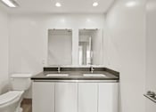 Thumbnail 22 of 49 - Bathroom with Double-Sink Vanity at Gramercy Park by Wiseman, Los Angeles, 90004