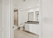 Thumbnail 21 of 49 - Bathroom with Bathtub at Gramercy Park by Wiseman, Los Angeles, CA