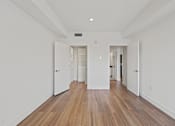 Thumbnail 16 of 49 - Bedroom with Walk-In Closet at Gramercy Park by Wiseman, Los Angeles