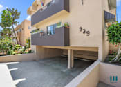 Thumbnail 31 of 36 - Front Entrance and Covered Resident Parking of Alfred Atlas