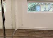 Thumbnail 21 of 39 - Bedroom with Mirrored Closet and Recessed Lighting