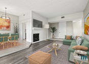 Thumbnail 3 of 62 - Open-Concept Dining and Living Room Area with Electric Fireplace