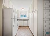 Thumbnail 9 of 65 - Kitchen with Refrigerator, Stove, Dishwasher, and Ample Cabinet Storage