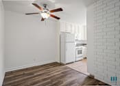 Thumbnail 12 of 65 - Dining Room with Overhead Ceiling Fan and Vinyl Flooring