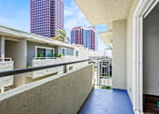 Thumbnail 62 of 65 - A balcony with a view of the city.