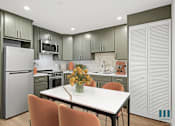 Thumbnail 2 of 71 - Studio with Full-Size Kitchen with Refrigerator, Stove, and Microwave Oven
