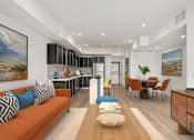 Thumbnail 39 of 106 - Living Room with Kitchen at Ogden Garden by Wiseman, California, 90036