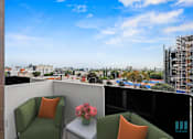 Thumbnail 19 of 106 - Patio with Views of the City at Ogden Garden by Wiseman, California, 90036