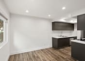 Thumbnail 24 of 39 - Apartment Dining and Kitchen Area