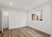 Thumbnail 33 of 39 - Bedroom with Recessed Lighting and Window