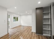 Thumbnail 32 of 39 - Open-Concept Living Room Space with Storage