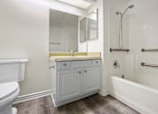 Thumbnail 26 of 48 - Large Handicap Accessible Bathroom with Full-Size Bathtub