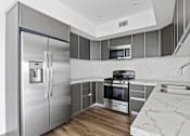 Thumbnail 13 of 71 - Modern Kitchen with Energy-Efficient Appliances
