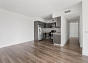 Thumbnail 17 of 71 - Open-Concept Kitchen and Dining Space with Vinyl Flooring