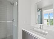 Thumbnail 21 of 71 - Bathroom with Stand-Up Shower with Glass Door and Vanity Cabinet Storage