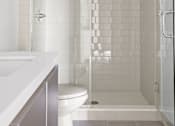 Thumbnail 28 of 71 - Bathroom with Walk-In Shower & Glass Door, and Vanity Cabinet Storage