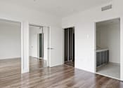 Thumbnail 32 of 71 - Bedroom with Two Mirrored Closets and Bathroom