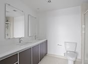 Thumbnail 33 of 71 - Bathroom with Walk-In Shower & Glass Door, and Vanity Cabinet Storage