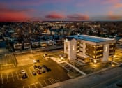 Thumbnail 1 of 31 - an aerial view of a building in a city at night