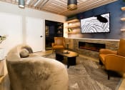 Thumbnail 31 of 31 - a living room with a couch and a tv