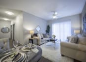 Thumbnail 2 of 44 - Living Room View With Expansive Window at The Ivy at Berlin Place, South Bend, IN