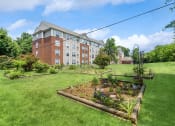 Thumbnail 7 of 12 - Exterior Garden at Guardian Place in Richmond, VA