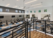 Thumbnail 17 of 31 - Fitness center at Kensley Apartment Homes