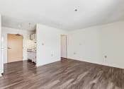 Thumbnail 1 of 12 - Living Room and Kitchen at Guardian Place in Richmond, VA