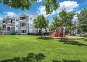Thumbnail 27 of 31 - Playground at Kensley Apartment Homes