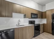 Thumbnail 7 of 18 - Vacant Kitchen at GEO Apartment in Fremont CA