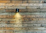 Thumbnail 6 of 11 - the wall is made of reclaimed wood with a light on it
