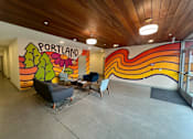 Thumbnail 4 of 43 - A brightly colored mural with the word "Portland" written on it.