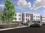 Thumbnail 1 of 8 - A modern building with a tree in front and people walking on the sidewalk.