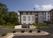 Thumbnail 5 of 24 - Building Exterior Back View at The TROTTA, Wisconsin