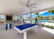 Thumbnail 39 of 78 - play pool at the retreat at thousand oaks apartments with pool table at Altis Blue Lake, Lake Worth, FL, 33467