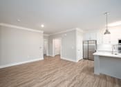 Thumbnail 56 of 67 - a kitchen and living room in a 555 waverly unit