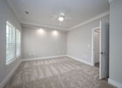 Thumbnail 58 of 67 - an empty bedroom with a ceiling fan