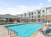 Thumbnail 1 of 60 - our apartments offer a swimming pool with chairs and umbrellas
