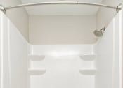 Thumbnail 45 of 60 - a white bathroom with a shower and a sink