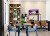 Thumbnail 9 of 49 - a room with a table and chairs