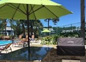 Thumbnail 14 of 21 - Fun outdoor Kitchen by the pool at Lake in the Woods, Melbourne, FL, 32901