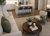 Thumbnail 29 of 40 - A modern living room with a grey sofa, a wooden coffee table, and a kitchen in the background.