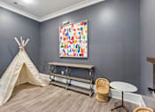 Thumbnail 14 of 53 - a play room with a teepee and a painting on the wall