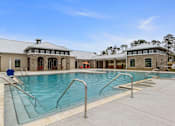Thumbnail 2 of 53 - the preserve at ballantyne commons pool and building with swimming pool